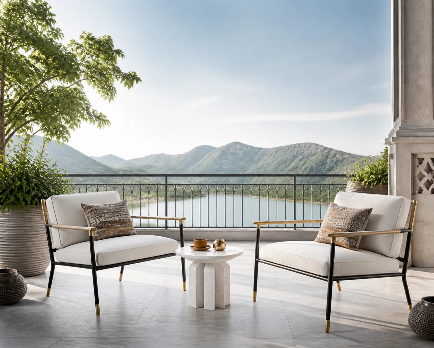 Luxury apartment balcony lounge with compact modern outdoor loveseat, marble side pedestals, and city skyline views